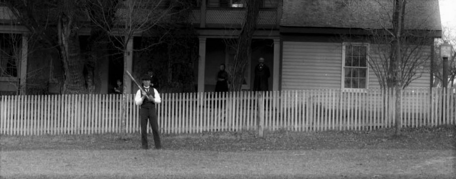 Crowe-Garritt House, with baseball player